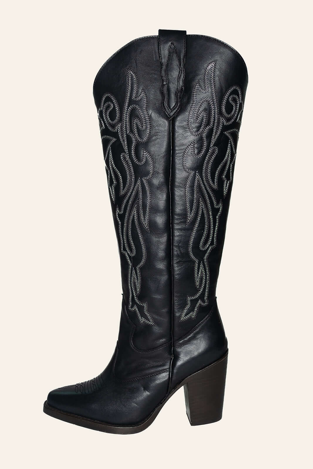 Left side view of Charlotte black leather boots with silver metallic stitching, emphasizing their elegant western design and bold detailing.